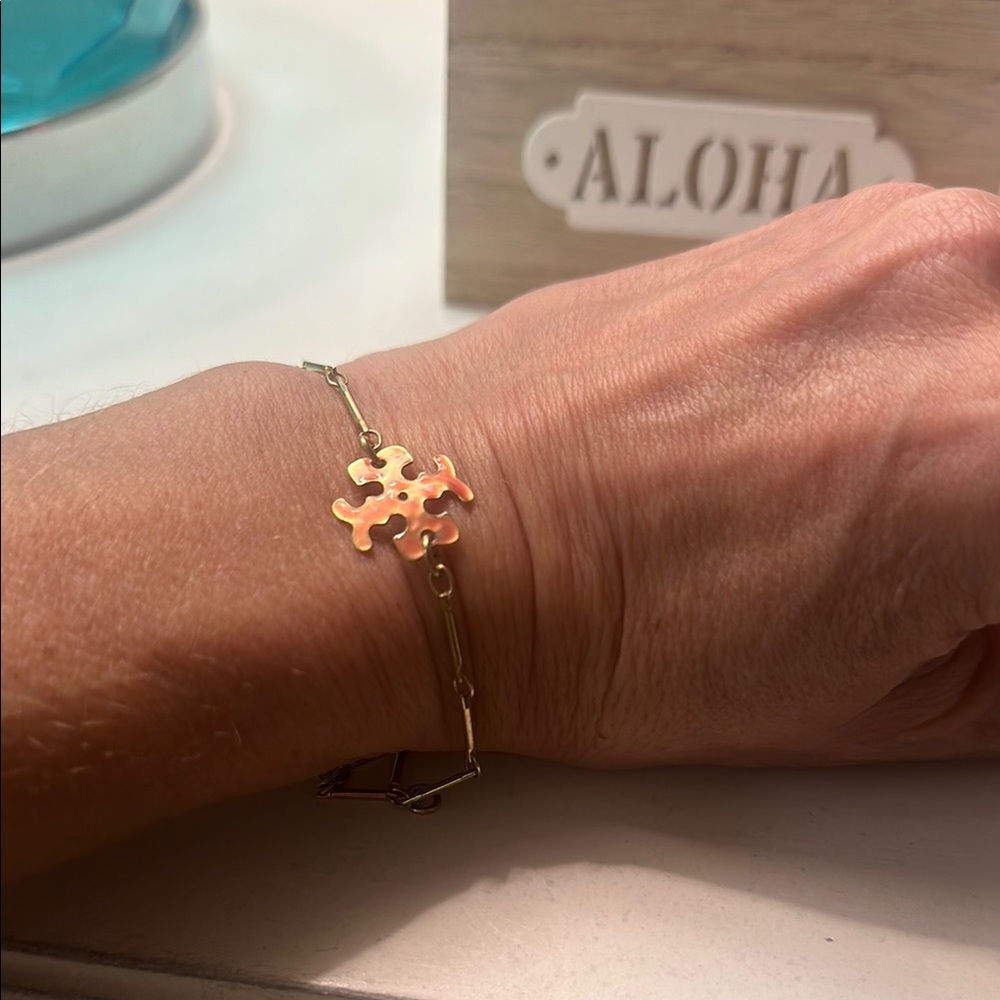Tory Burch Gold Bracelet with Floral Charm